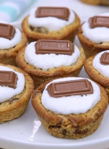 Delicious 4 Ingredient S’Mores Cookie Cups with chocolate and marshmallows