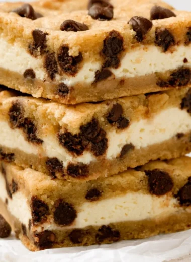 Delicious chocolate chip cheesecake stuffed cookies on a plate