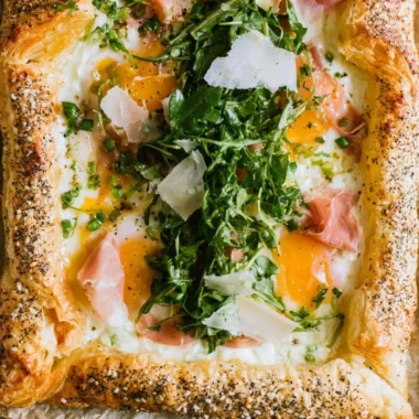 Cozy baked prosciutto and egg breakfast tart on a plate