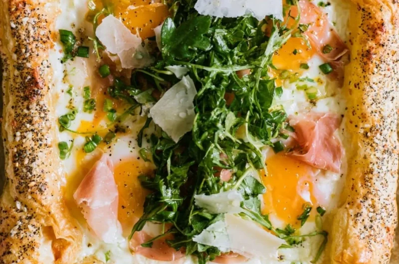 Cozy baked prosciutto and egg breakfast tart on a plate