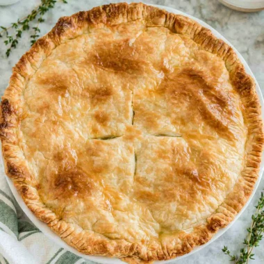 Cozy Chicken Pot Pie with flaky crust and savory filling of chicken and vegetables.