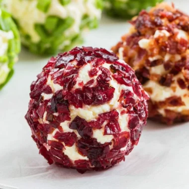 Cozy mini cheeseball bites served on a platter for a festive gathering