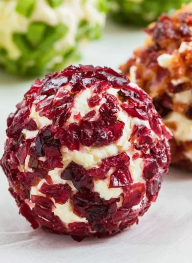 Cozy mini cheeseball bites served on a platter for a festive gathering