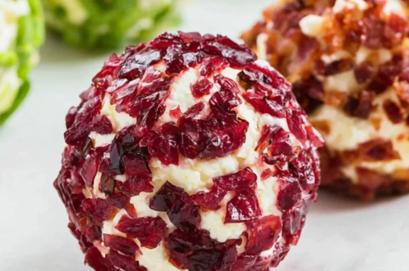 Cozy mini cheeseball bites served on a platter for a festive gathering