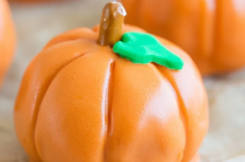 Cozy no-bake pumpkin shaped Oreo balls for a festive fall treat
