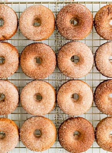 Cozy pumpkin spice donuts topped with cinnamon for a fall treat