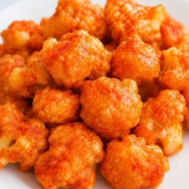 Delicious vegan cauliflower nuggets served with a dipping sauce