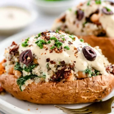 Delicious cozy vegan stuffed sweet potatoes with healthy fillings on a plate.