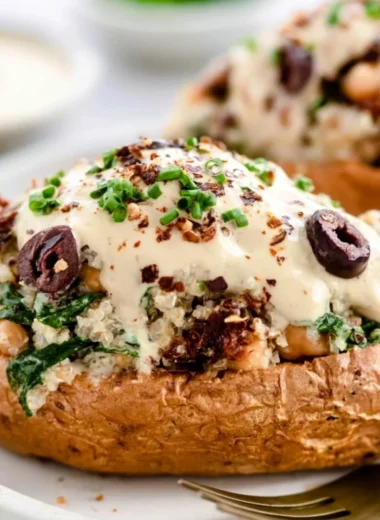 Delicious cozy vegan stuffed sweet potatoes with healthy fillings on a plate.