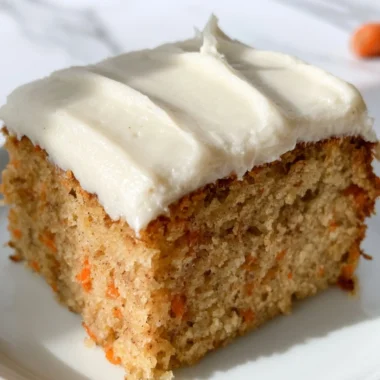 Delicious dairy-free carrot cake topped with cream cheese frosting