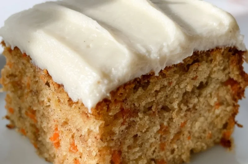 Delicious dairy-free carrot cake topped with cream cheese frosting