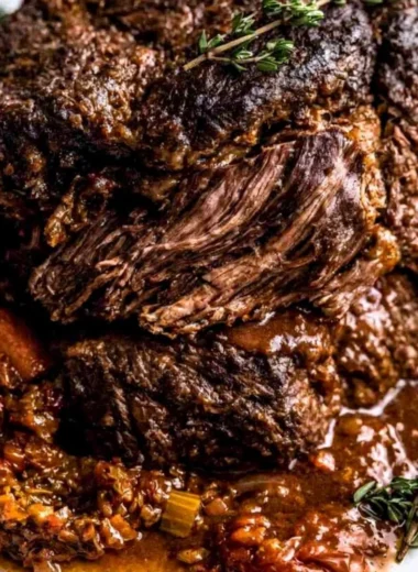 Ina Garten's Company Pot Roast served with vegetables and gravy