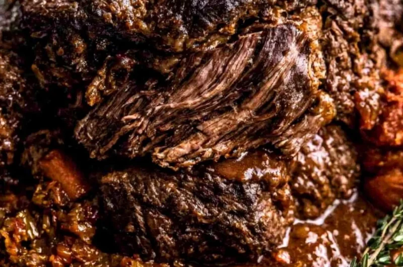 Ina Garten's Company Pot Roast served with vegetables and gravy