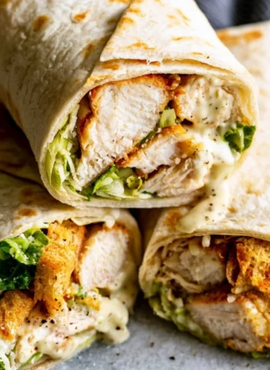 Cozy Chicken Caesar Wrap with grilled chicken, romaine lettuce, and Caesar dressing