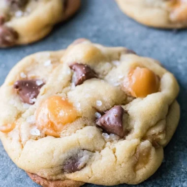 Cozy chocolate chip salted caramel cookies with a warm, gooey center.