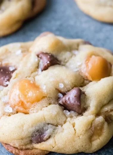 Cozy chocolate chip salted caramel cookies with a warm, gooey center.