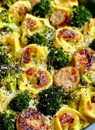 Sheet pan broccoli tortellini bake served in a colorful dish
