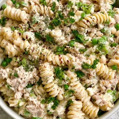 Bowl of easy tuna pasta salad with vegetables and dressing