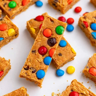 No-bake monster cookie protein bars made with oats, chocolate, and peanut butter