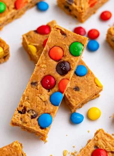 No-bake monster cookie protein bars made with oats, chocolate, and peanut butter