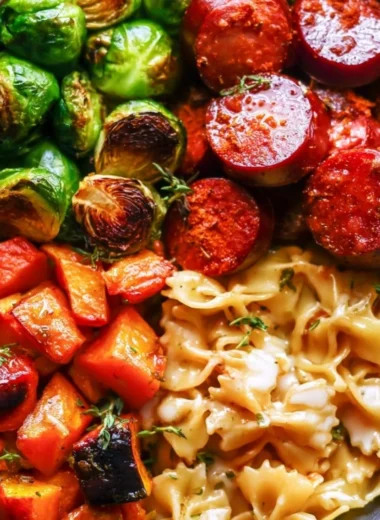 Autumn dinner featuring sausage, pasta, Brussels sprouts, and butternut squash dish