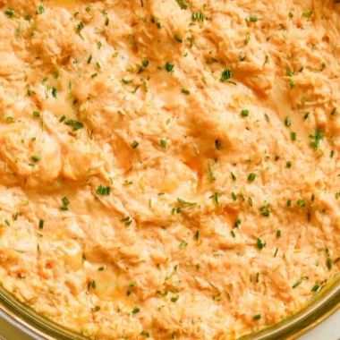 Healthy Greek yogurt buffalo chicken dip served in a bowl