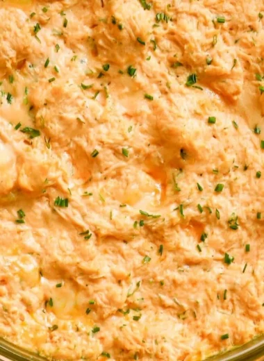 Healthy Greek yogurt buffalo chicken dip served in a bowl