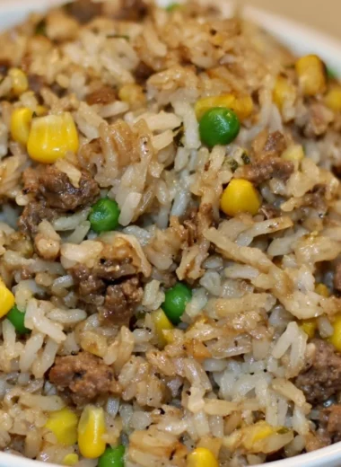Plate of homemade dirty rice with ground beef and vegetables