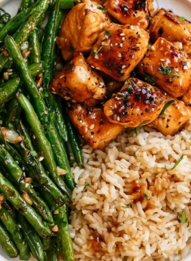 Honey Garlic Chicken served with vibrant green beans
