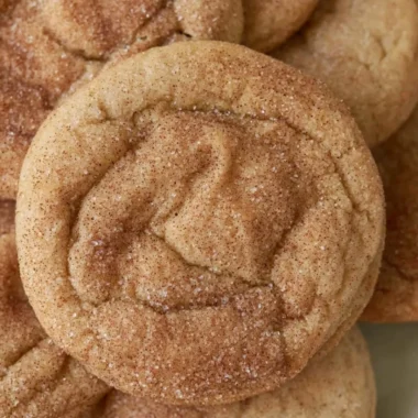 Freshly baked Maple Snickerdoodles on a cooling rack
